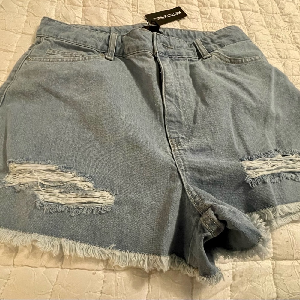 PRETTY LITTLE THINGS ; SHAPE BLEACH WASH RIPPED HEM DENIM SHORTS SIZE 8